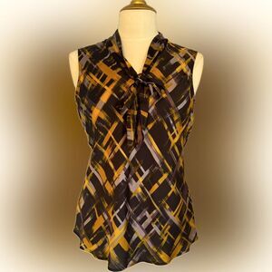 New with tags! Kasper Multi-colored front-tie blouse! Perfect Businesswear!